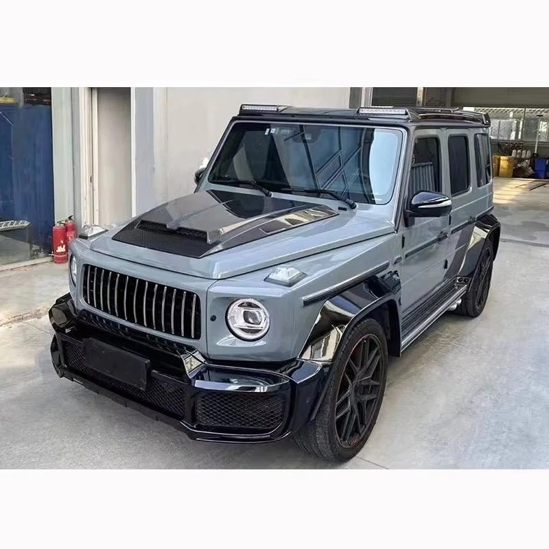 Suitable for 2019+ G-Class W463 W464 B-type Carbon Fiber 4-piece Set Engine Hood Roof Light Tire Cover Spoiler
